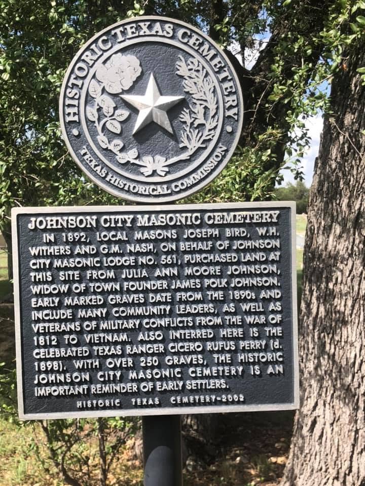 The Historic Texas Cemetery plaque under a live oak: the Texas Historical Commission seal above the marker text describing the 1892 purchase.